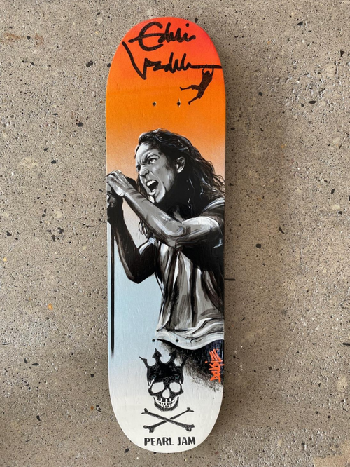 Custom skateboard deck featuring a black and white portrait of a singing man and an orange-to-white gradient.